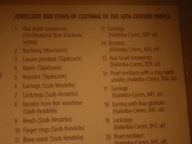 Diamond-like rounded swastika engraved on a circular metal sheet